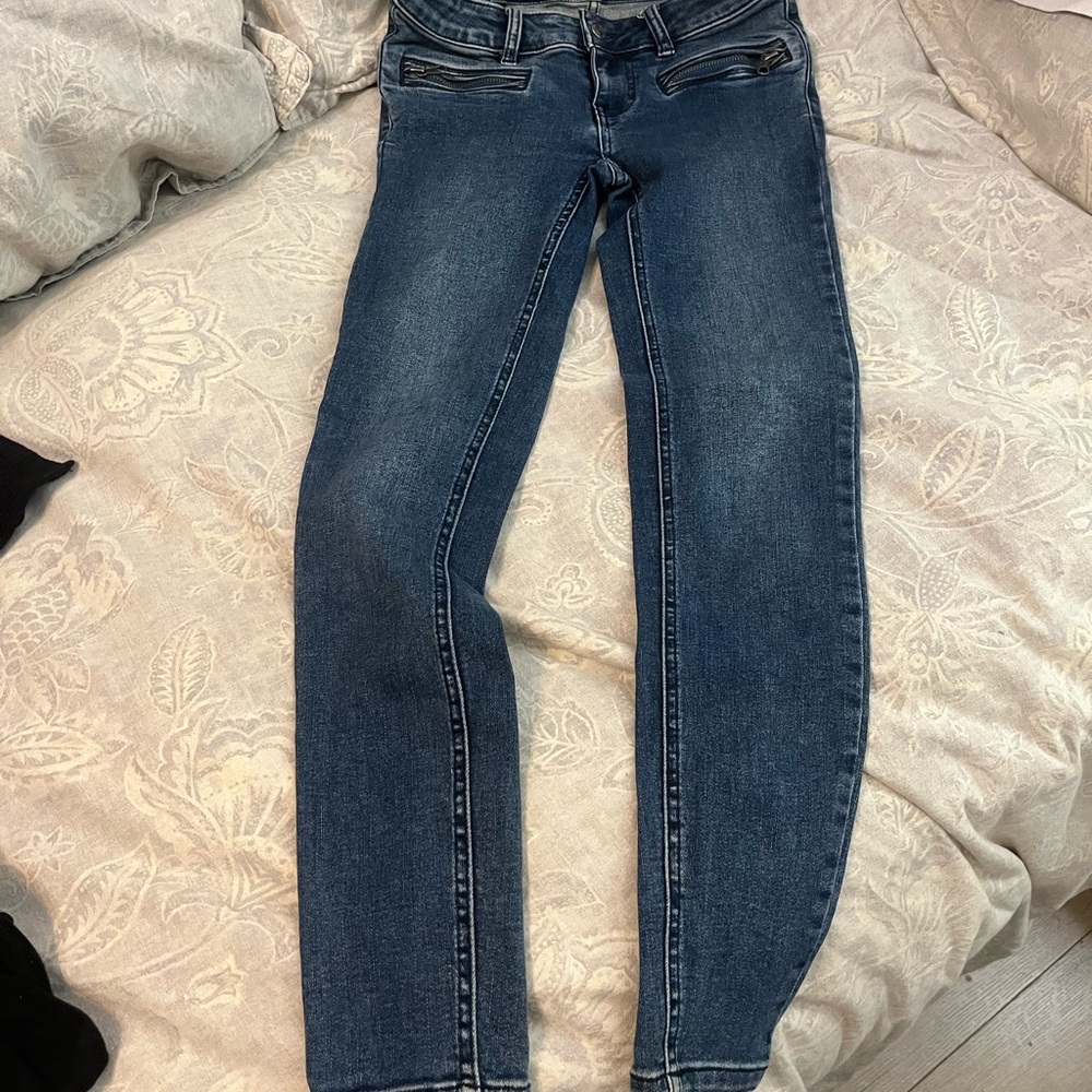 Free people stretchy skinny jeans.